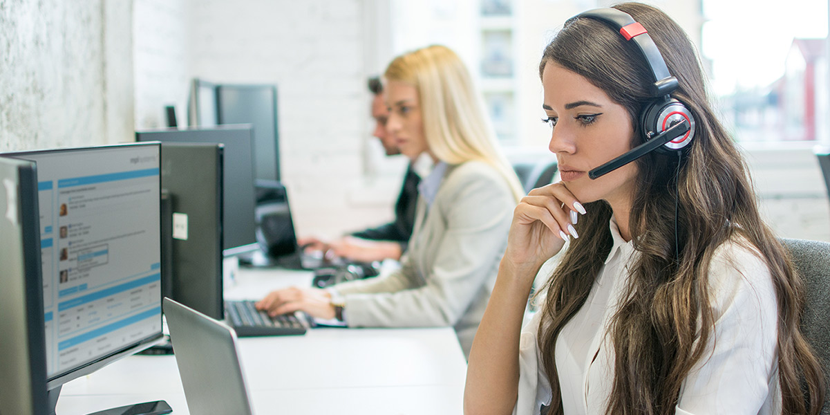 Girl on telephone-system hosted-pbx-vs-on-premise-pbxs